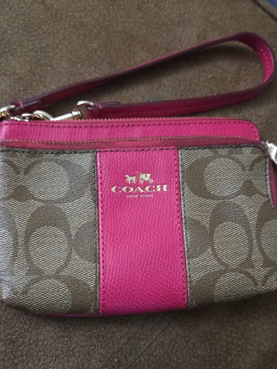 Coach Handbags - COACH Brown Signature Canvas Wristlet with Pink Leather Trim